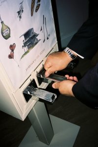 Using Galileo's Flower Shops vintage vending machine at a wedding at the White Chapel in Palm Harbor, Florida